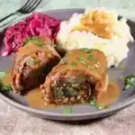 Delicious beef rouladen rolled with savory fillings on a plate