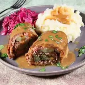 Delicious beef rouladen rolled with savory fillings on a plate
