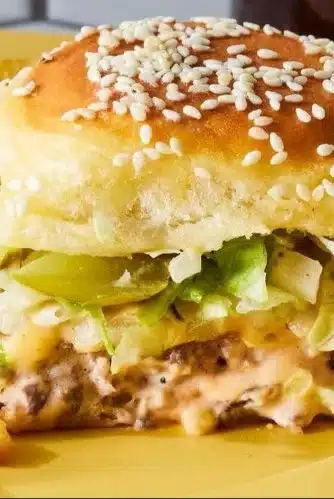 Mini Big Mac Sliders served with toppings and sauces