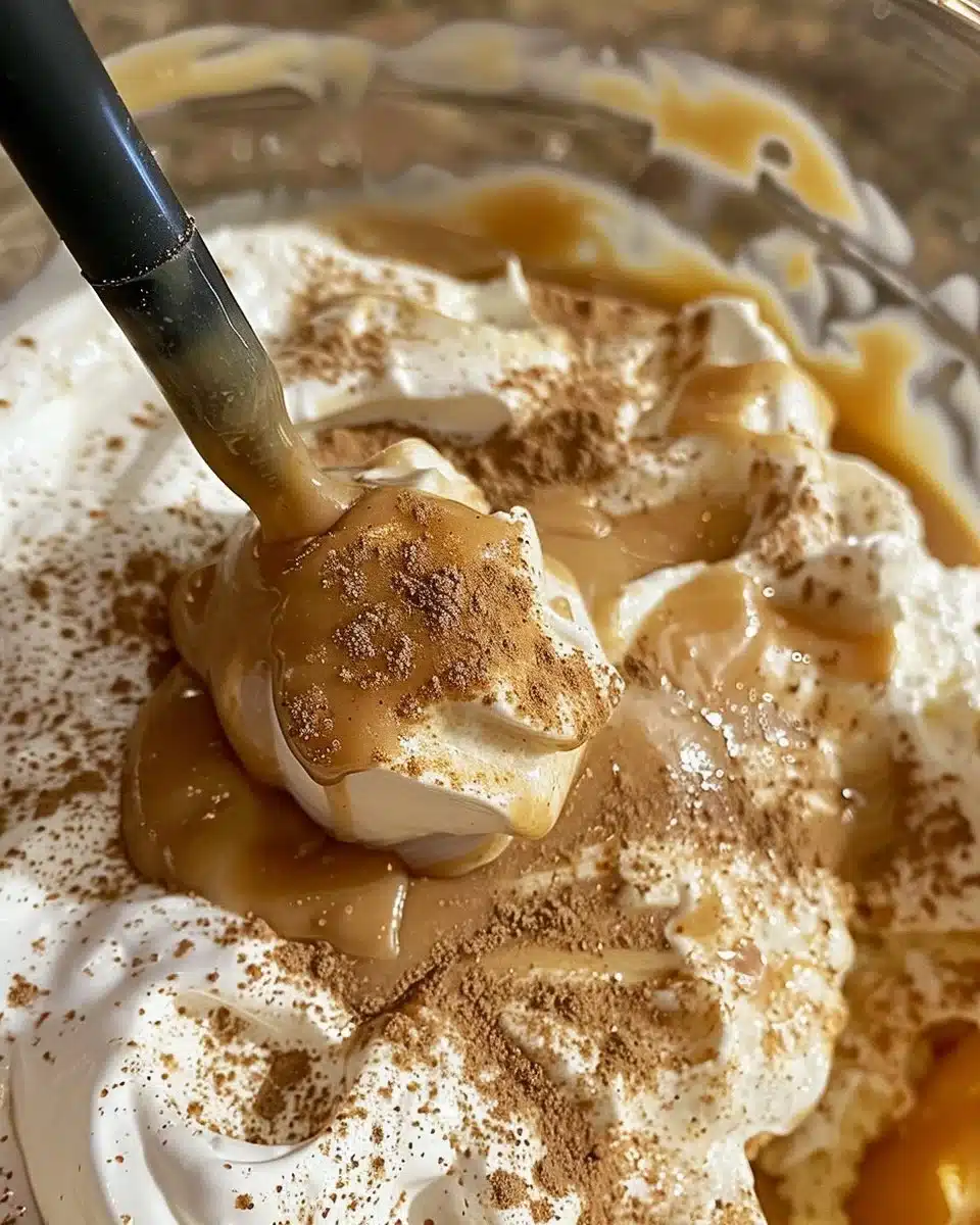 Gingerbread Dulce De Leche Cake topped with caramel and spices