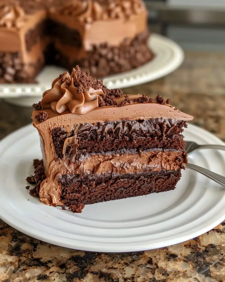 Slice of Brooklyn Blackout Cake with rich chocolate layers and frosting