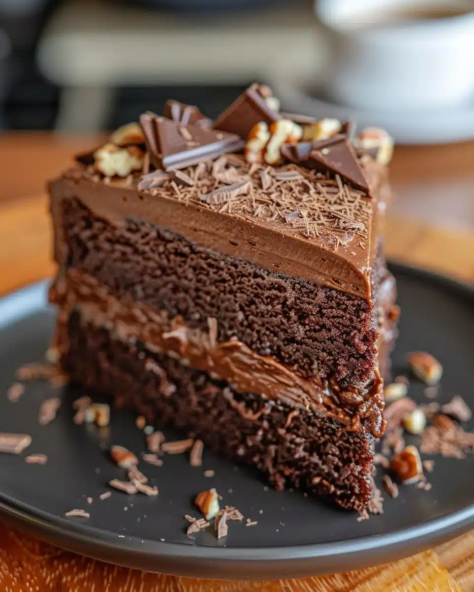 Delicious slice of homemade German Chocolate Cake with coconut and pecan frosting