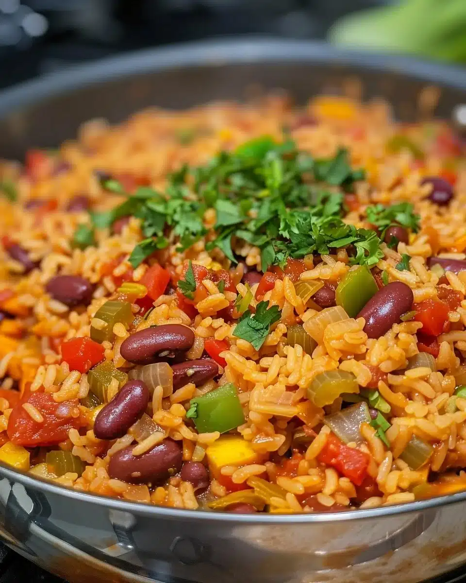 Bowl of cooked slow-cooker vegan jambalaya with vibrant vegetables and spices