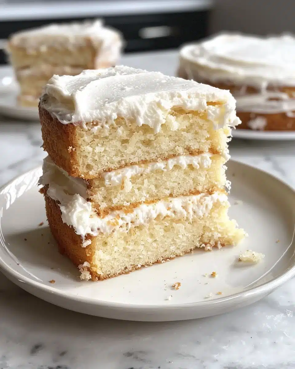 Delicious sugar cookies decorated with smooth vanilla buttercream frosting