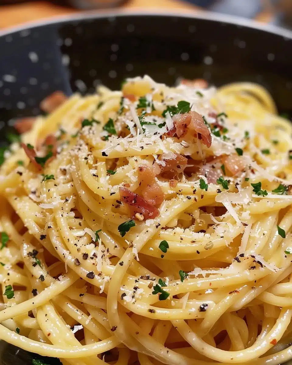 Plate of authentic Carbonara pasta with pancetta and creamy sauce