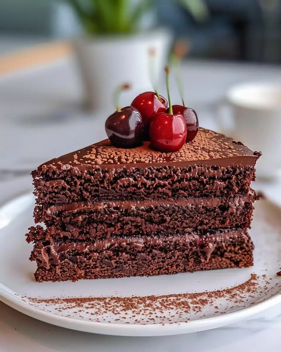 Delicious Black Forest Cupcakes topped with cherries and whipped cream