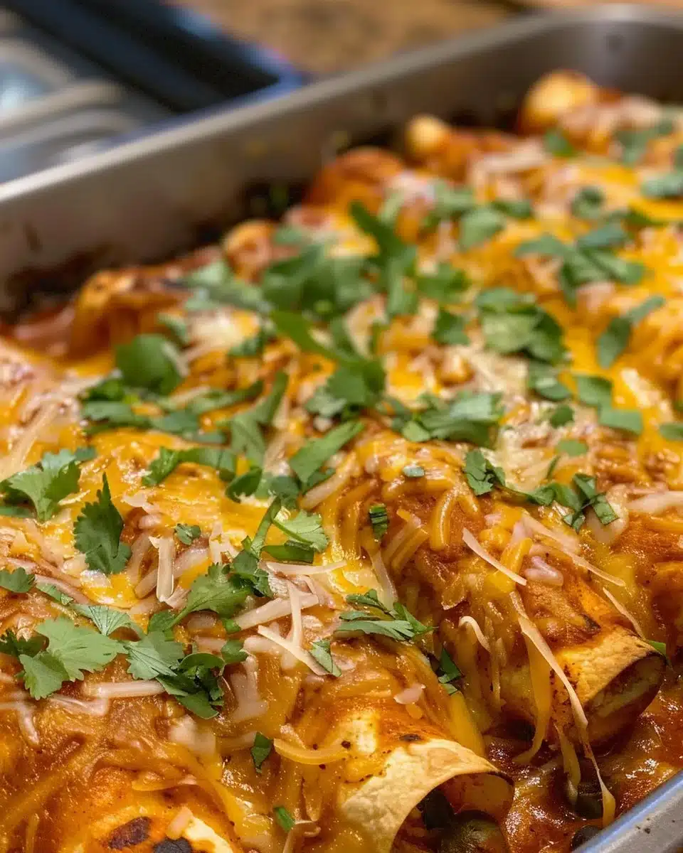 Delicious Chicken Enchilada Skillet topped with cheese and fresh herbs