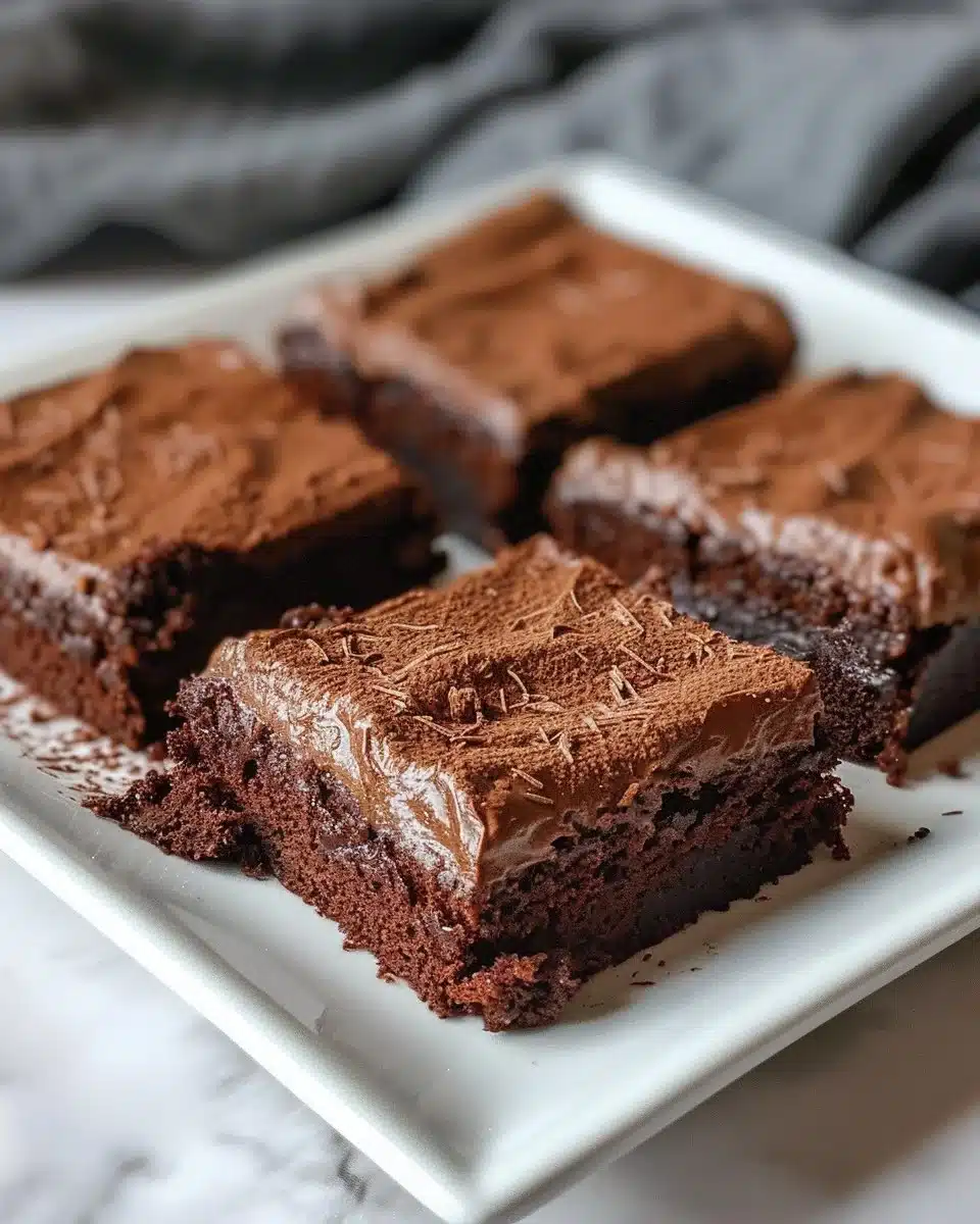 Chocolate cake covered with smooth chocolate ganache